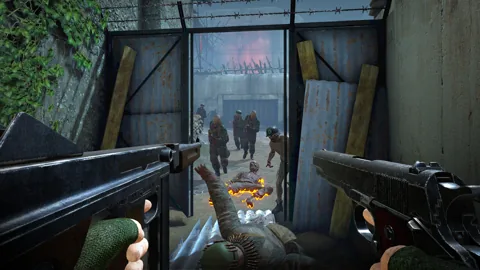 Dual pistols cover a doorway as a horde approaches.