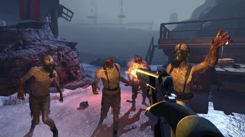 A horde approaches through a snowy settlement.